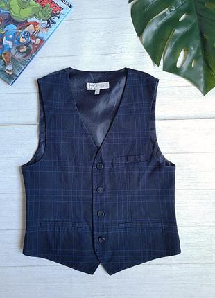 Костюмна жилетка