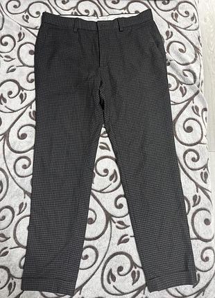 Брюки в клітинку скіні next