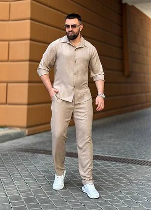 Чоловічий лляний костюм жатка штани вільного крою і сорочка на гудзиках з довгими рукавами