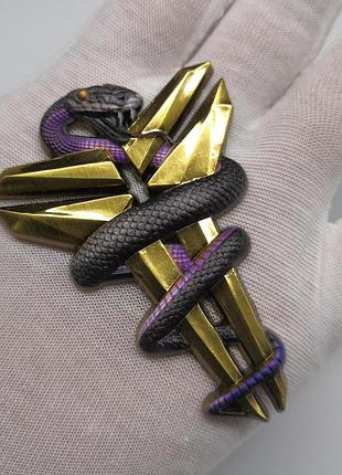 Медаль із емблемою духа

чорної мамби