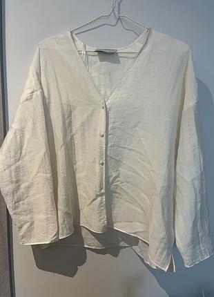 Молочна напівпрозора блуза