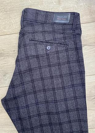 Штани в клітинку