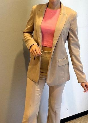 Бежевий піджак 32 розмір