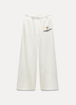 Білі котонові штани zara з вишивкою , широкі