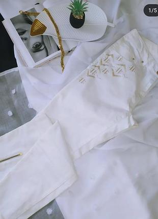 Джинси з вишивкою