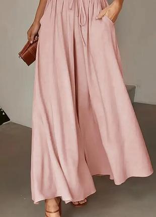 Широкие женские брюки с карманами