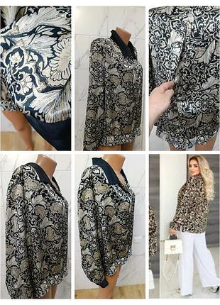 Очень красивая сатиновая блуза, снизу имеет резинку.50-52.