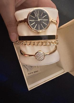 Жіночий годинник anne klein ak/1470gbst чорний/золото