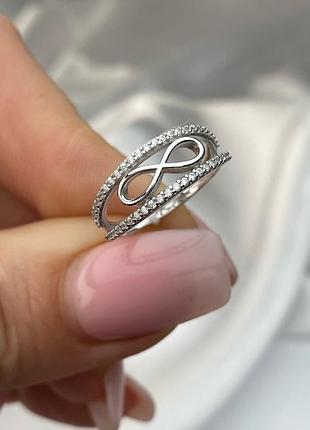 Серебряная кольца с камушками бежничность, бесконечность