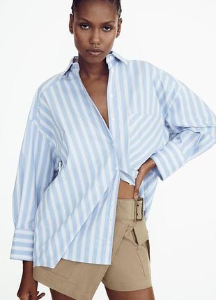 Блакитна оверсайз сорочка в у смужку