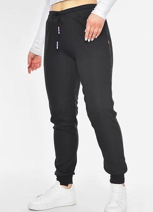 Штани жіночі однотонні чорного кольору