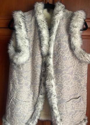 Жилетка тепла