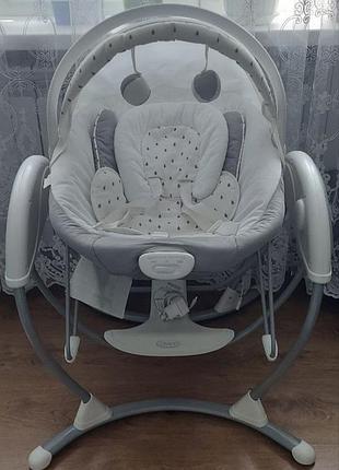 Кресло качели graco glider elite clouds