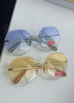 Круглые солнцезащитные очки безоправные rita bradley желтые голубые