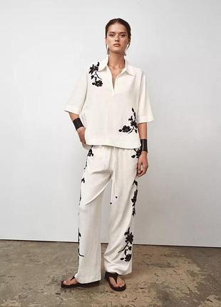 Костюм жіночий білий з квітами брючний zara new