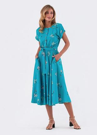 Розкльошена сукня-міді з принтом3 фото