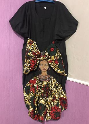 Неймовірна жіноча туніка з аплікацією