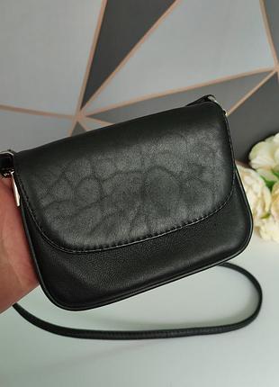 Маленькая кожаная женская сумочка