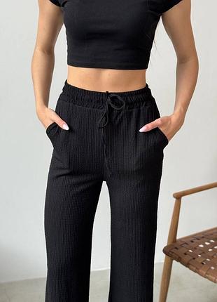 Стильные комфортные летние легкие женские брюки с карманами на завязке на резинке