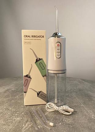 Oral irrigator