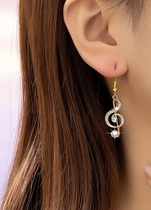Серьги со стразами скрипковые ключики золотистые