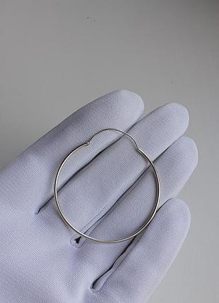 Одиночная серебряная серёжка конго