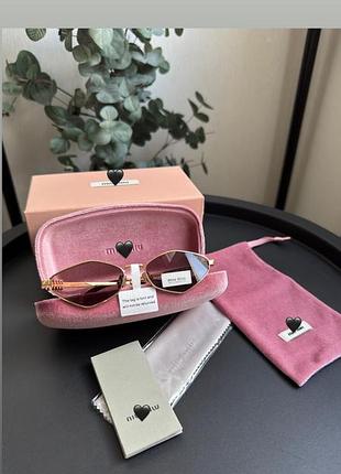 Сонцезахисні окуляри miu miu