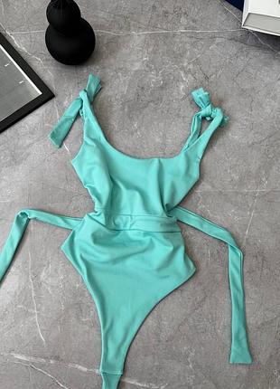 Суцільний купальник з біфлексу з завʼязкою на талу