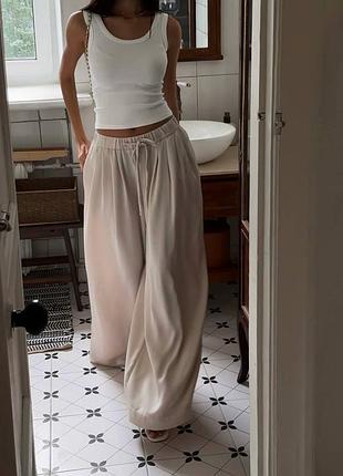 Шовкові оверсайз штани на резинці жіночі широкі