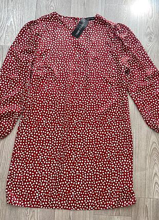 Шикарна жіноча сукня міді з принтом3 фото