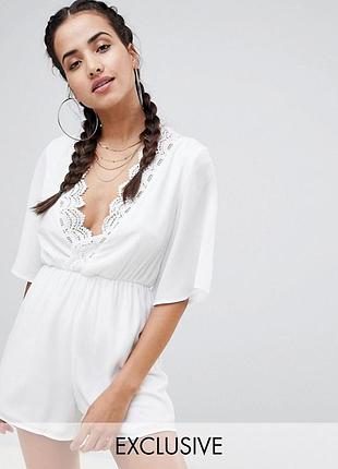 Білий комбінезон ромпер