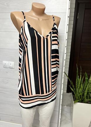 Легка майка в полоси.