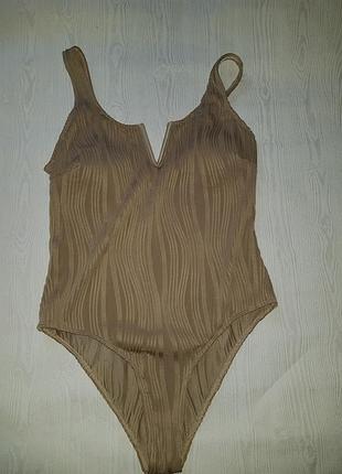 Суцільний купальник