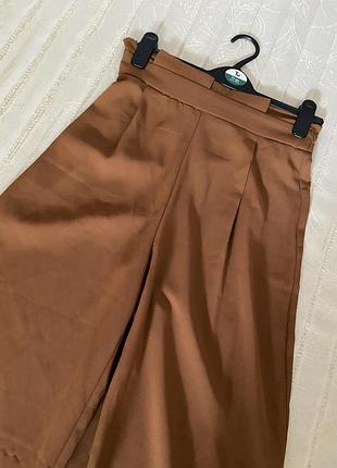 Брюки палацо.
