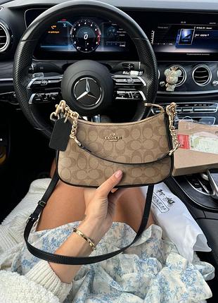 Сумка coach teri shoulder bag in signature canvas