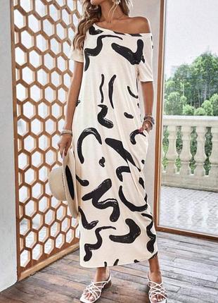 Стильное молочное платье-футболка с карманами