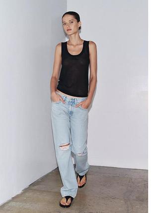 Джинси з потертостями zara