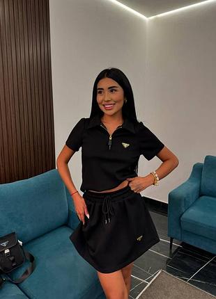 Літній костюм із спідницею