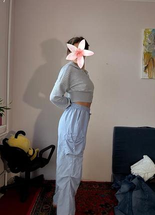 Штани вільні  кишенями на боках калоші/талія на стяжках регулюються. голубі. осінь.