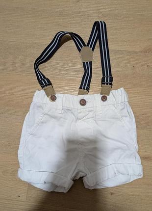 Шорти білі нам підтяжках