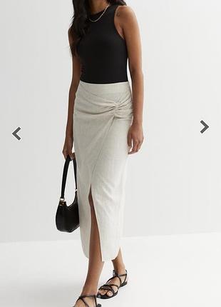 Діноча спідниця міді