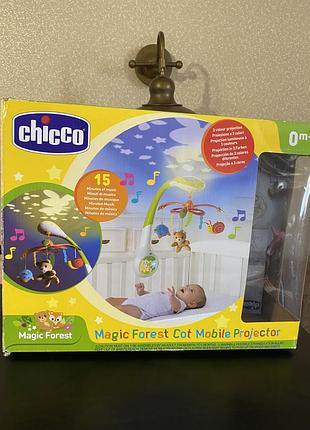 В идеальном состоянии крутой мобиль- проектор в кроватку chicco
