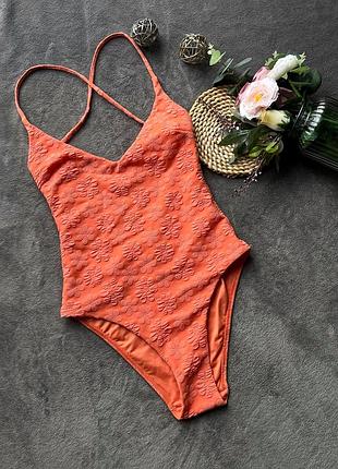 Суцільний жакардовий купальник в квітковий принт кораловий