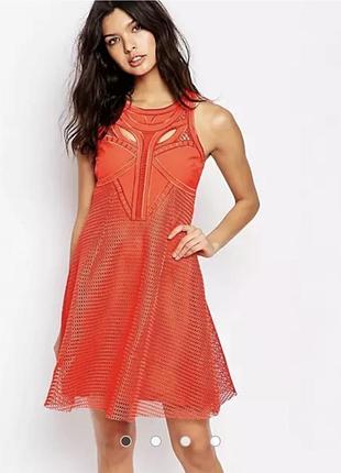 Фантастична помаранчева сукня з топом-корсетом і фактурною спідницею