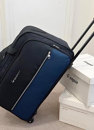 Дорожная сумка на колесах синяя с телескопической ручкой 40 литров