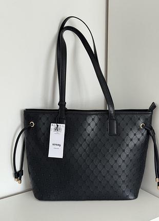 Нова вмістка сумка за гарною ціною