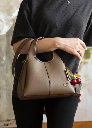 Женская кожаная брендовая сумочка coach