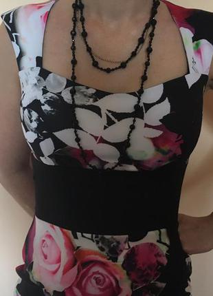 Стильное платье- сарафан с ярким цветочным принтом.2 фото