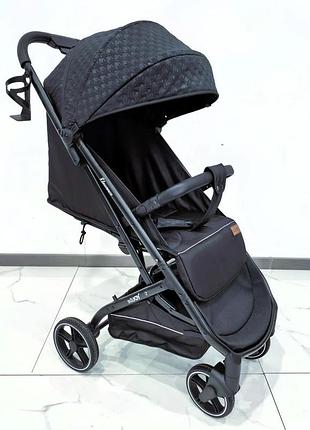 Детская прогулочная алюминиевая коляска с телескопической ручкой и подстаканником joy elegans a-50463