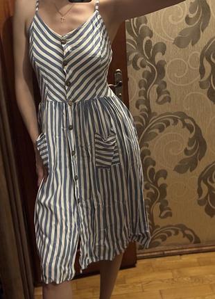 Сукня міді з кишенями